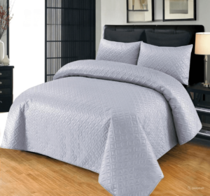 3 Piece Jersey Ultrasonic Quilted Bedspread Grey is on the bed