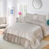 5-Piece Emboss Velvet Quilted Frilled Bridal Bedsheet Set Cream on the bed