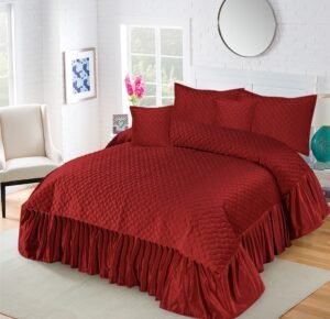 5-Piece Emboss Velvet Quilted Frilled Bridal Bedsheet Set Maroon is on bed